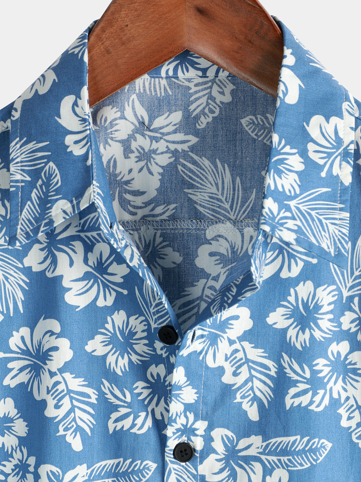 Camicia a maniche corte con motivo floreale tropicale blu da uomo