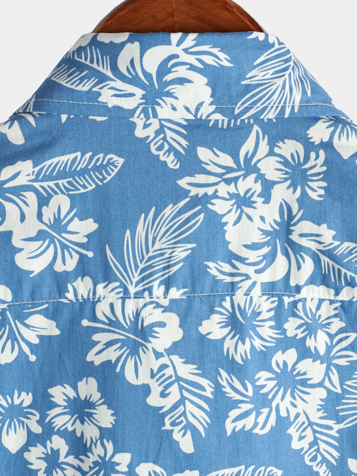 Camicia a maniche corte con motivo floreale tropicale blu da uomo